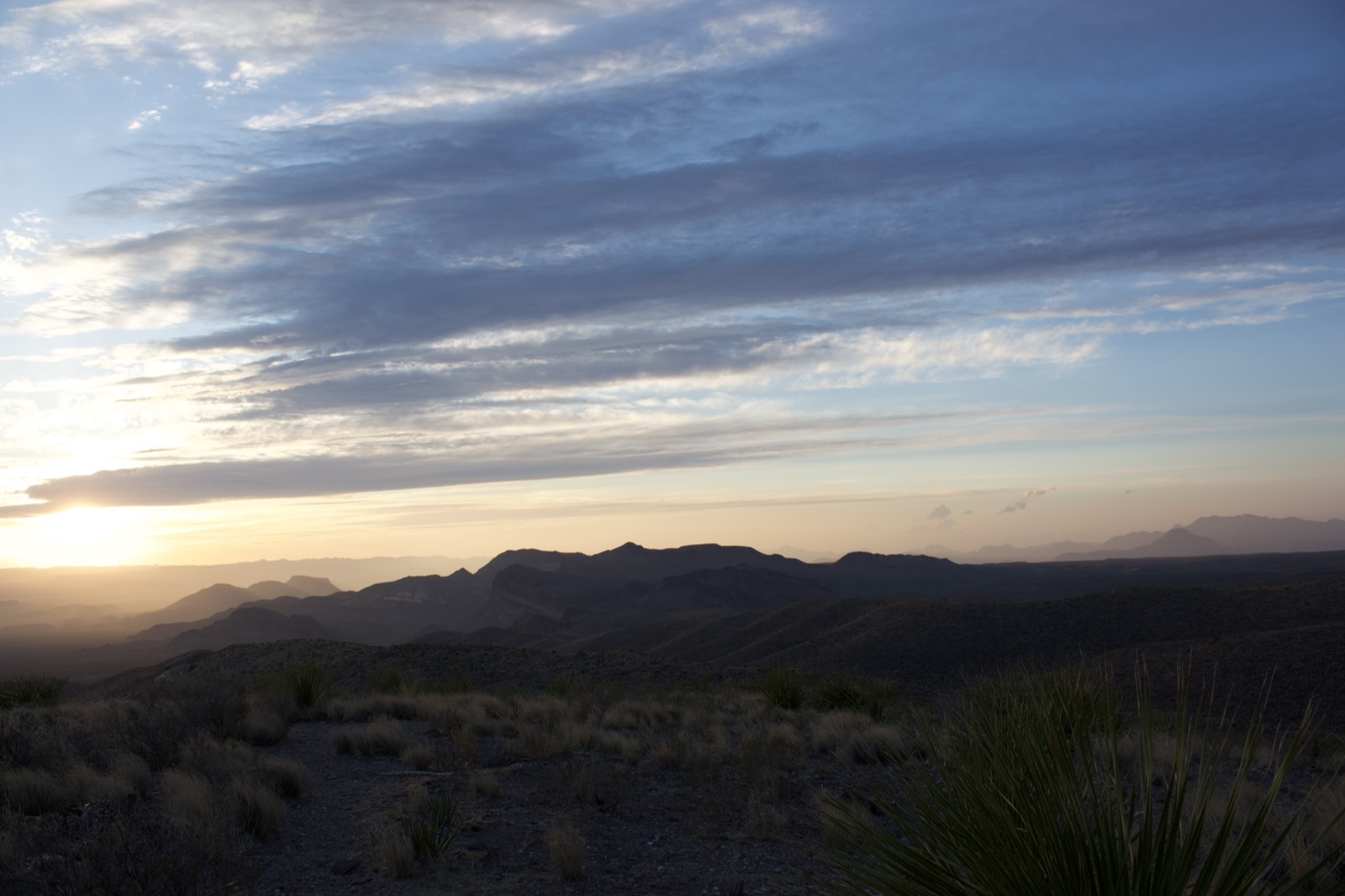 Desert Sunset Over Mountain Range