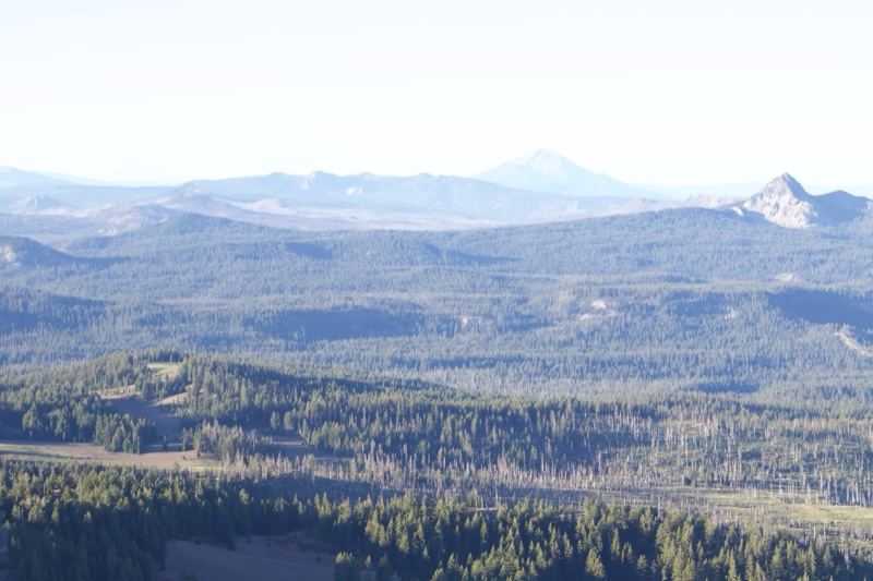 Distant Mountain Over Forested Valley