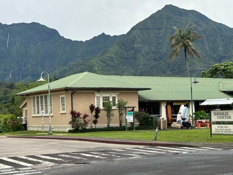 Beachfront Building With Mountain Backdrop