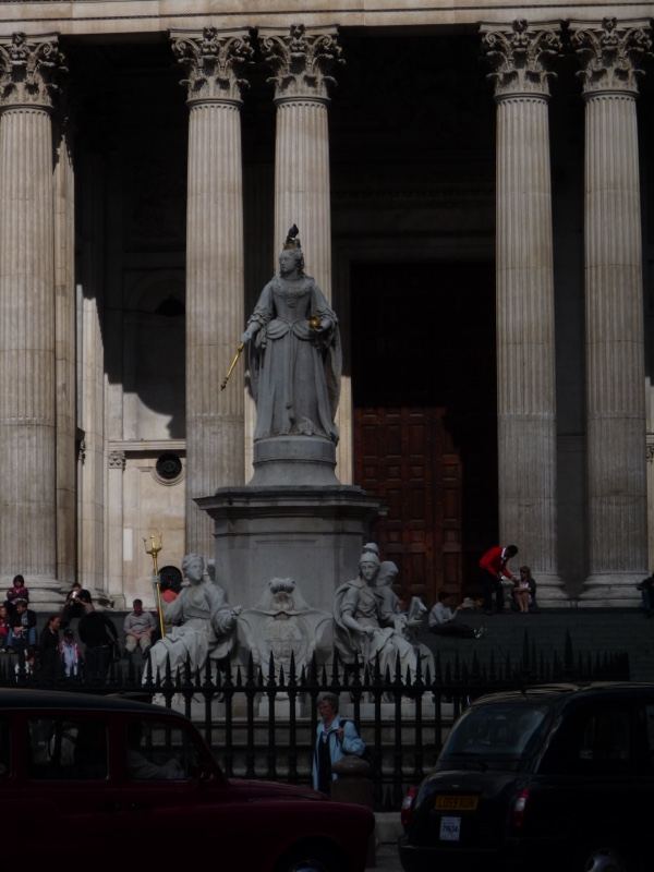 Statue before neoclassical colonnade London