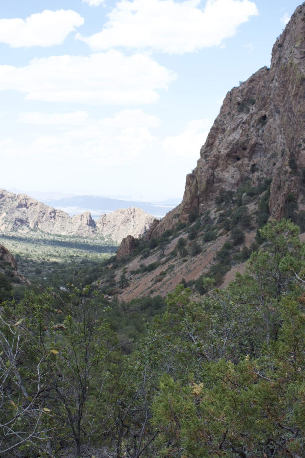 Rocky Canyon Valley Under Partly Cloudy Sky