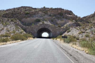 Desert Road Leading to Stone Tunnel
