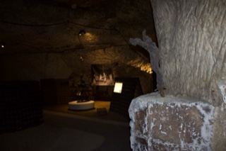 Dimly lit underground cave museum interior