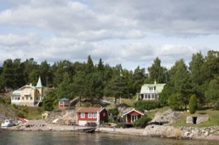 Coastal cabins on rocky shoreline