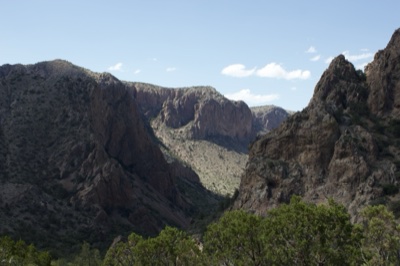 Rugged Canyon Mountains Under Blue Sky