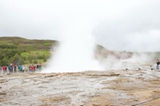 Geyser Eruption with Tourists Watching