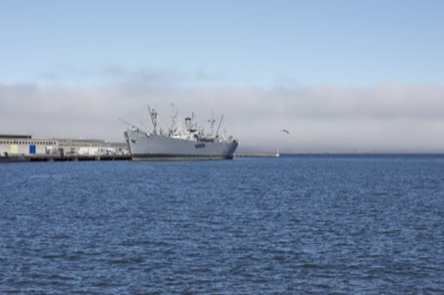 Gray Naval Ship at Foggy Harbor