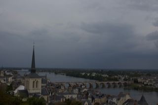 Overcast View of River Town with Church Spire