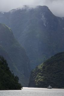 Misty Fjord Mountains With Boat