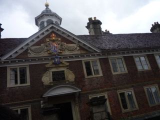 Historic brick manor with coat of arms