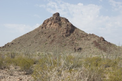Desert Butte With Rocky Summit