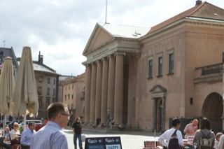 Classical building with outdoor cafe