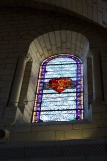 Stained Glass Heraldic Window in Stone Arch