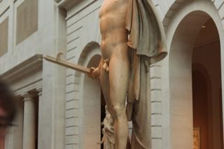 Marble statue in museum gallery
