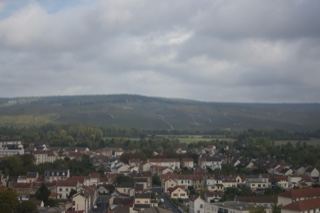 Overlook of Town Under Cloudy Sky