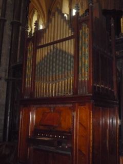 Wooden Pipe Organ in Gothic Church Interior
