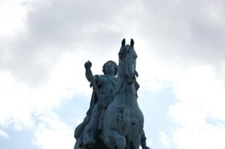 Equestrian Bronze Statue Against Cloudy Sky