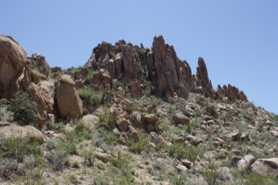 Rugged Desert Rock Formation Under Clear Sky