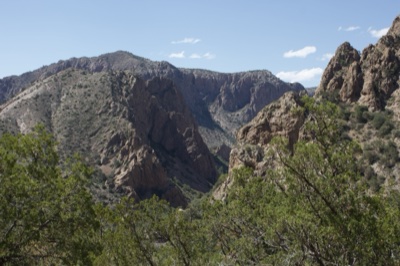 Rugged Canyon Mountains Under Blue Sky