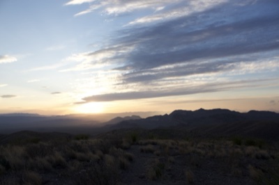 Desert Sunset Over Mountain Range