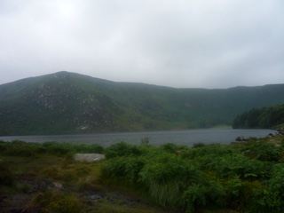 Misty Mountain Lake Under Overcast Sky