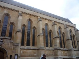 Gothic stone church exterior with tall windows