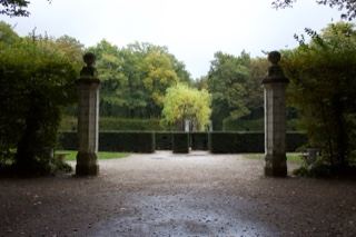 Formal Garden Entrance with Stone Pillars