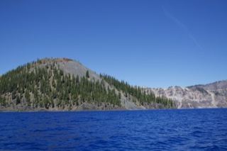 Crater Lake with Forested Volcanic Hill