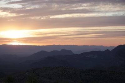 Sunset Over Layered Desert Mountains