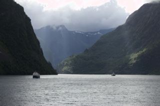Fjord Valley with Sunbeams and Boats
