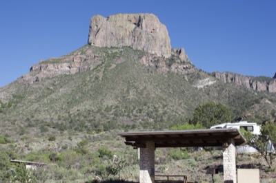 Mountain peak over desert campsite