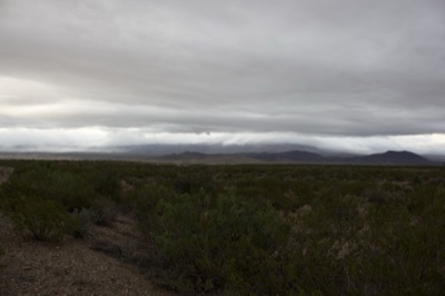 Overcast Desert Landscape With Mountains