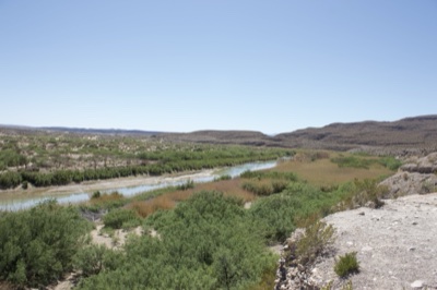 Desert River Valley Under Clear Sky