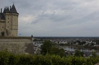 Castle Tower Over River Town View