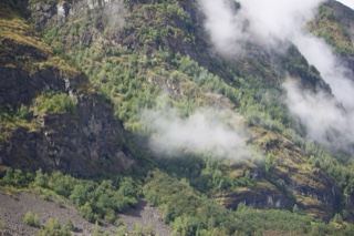 Misty Mountain Slope with Clouds