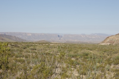 Desert Valley With Distant Mountains