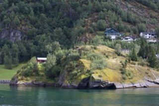Fjord shoreline with grassy peninsula