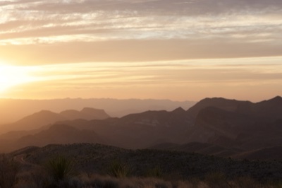 Desert Sunset Over Mountain Range