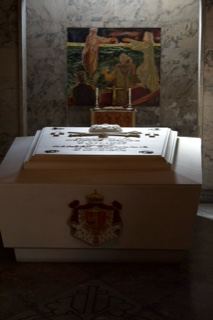 White sarcophagus in church interior