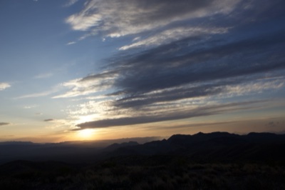 Sunset over mountain silhouette