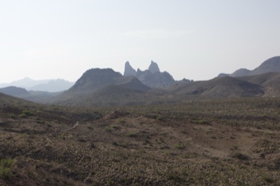 Arid Desert Mountains Under Hazy Sky