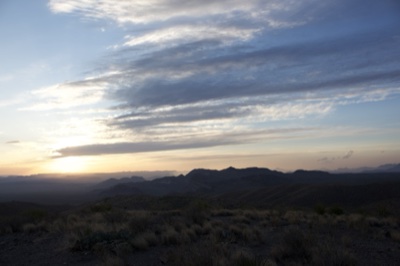 Desert Sunset Over Mountain Range
