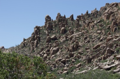 Rocky Desert Hillside Under Clear Sky