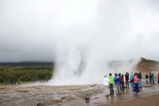 Geyser Eruption with Tourists Watching