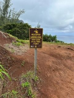 Helicopter Warning Sign on Cliff Trail