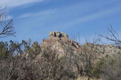 Desert Rock Formation Under Blue Sky