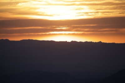 Sunset Over Mountain Silhouette