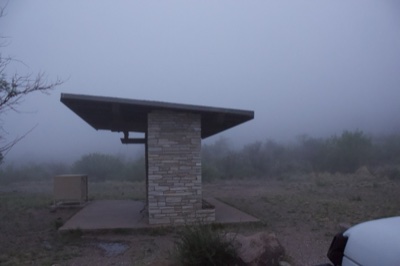 Foggy stone shelter in desert