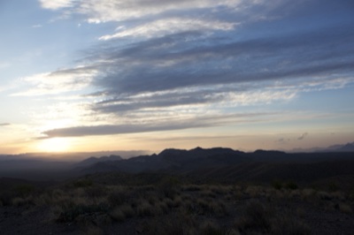 Desert Sunset Over Mountain Range