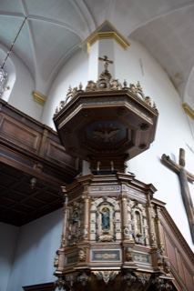 Ornate wooden church pulpit interior